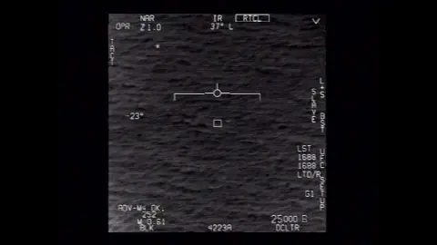 Official DVIDS frame from the GOFAST UAP video showing a small bright object above ocean texture