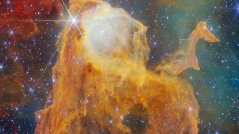 James Webb Space Telescope view of the glowing Treasure Chest cloud and young star cluster in the Carina Nebula